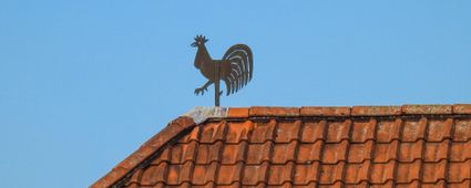 Dachschmuck: von der Wetterfahne bis zum Schlafwandler